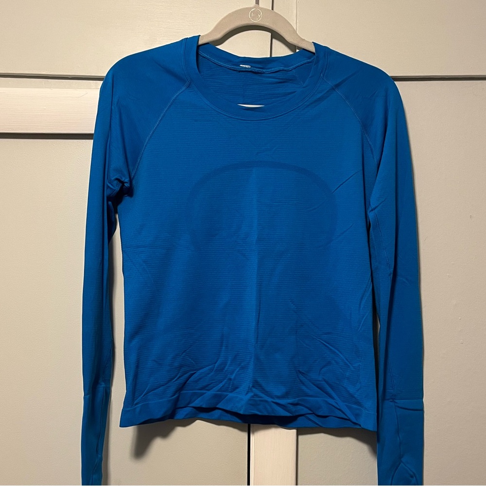 Women’s lululemon swiftly tech long sleeve- waist Length, royal blue, size 10